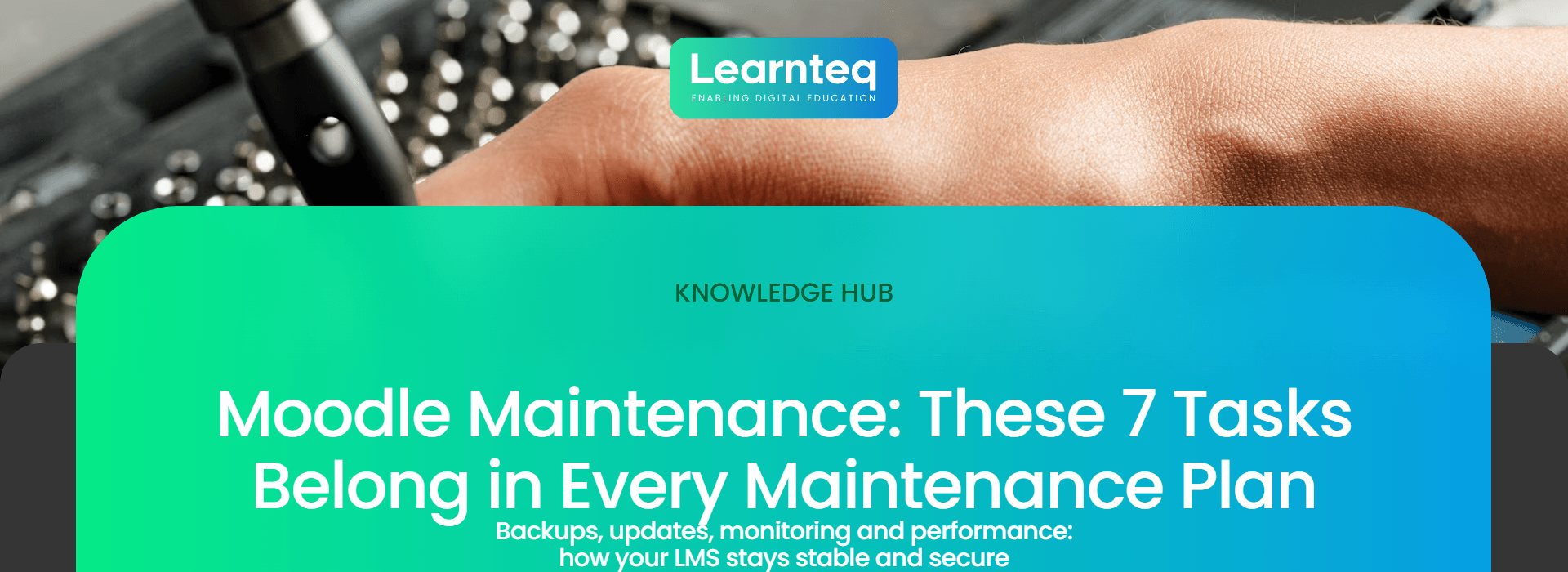 Moodle maintenance: technician working on computer hardware